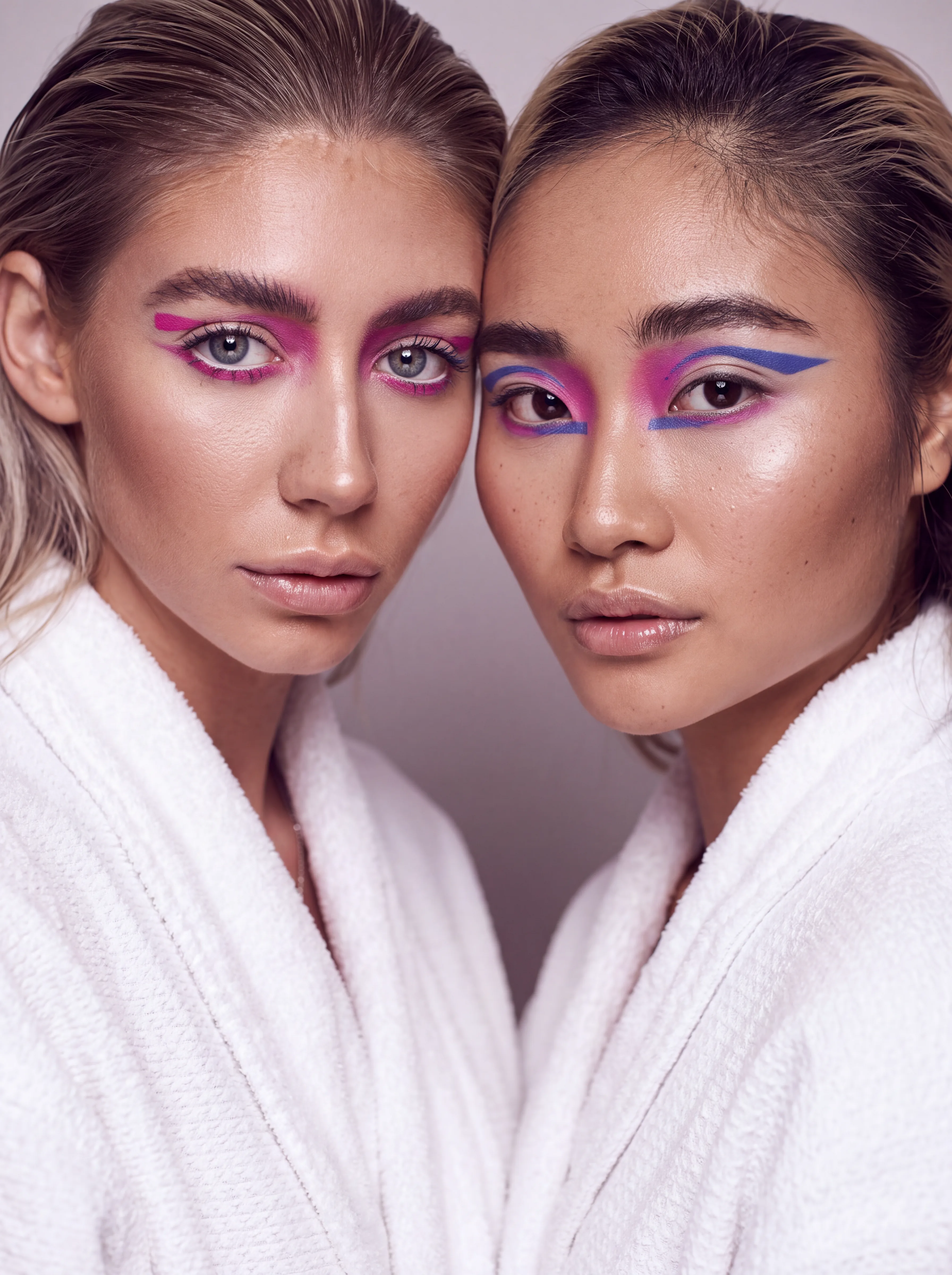 Editorial makeup with graphic pink and blue liner on two models - Pucca Diana, Bacău